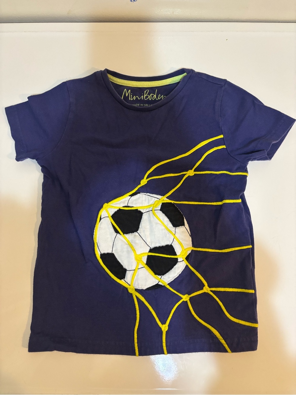 Mini Boden Navy Tee with Yellow Soccer Net Graphic 5-6Y